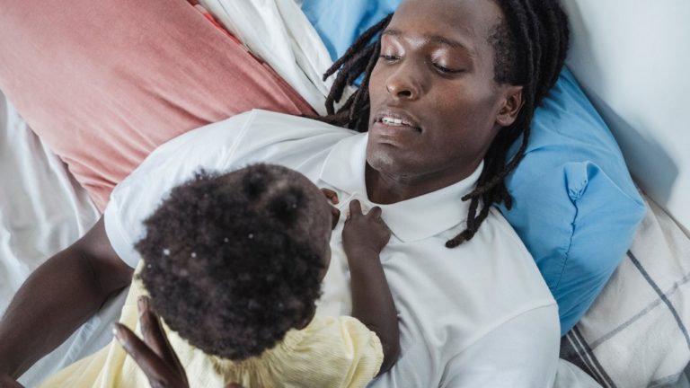 a man with a baby